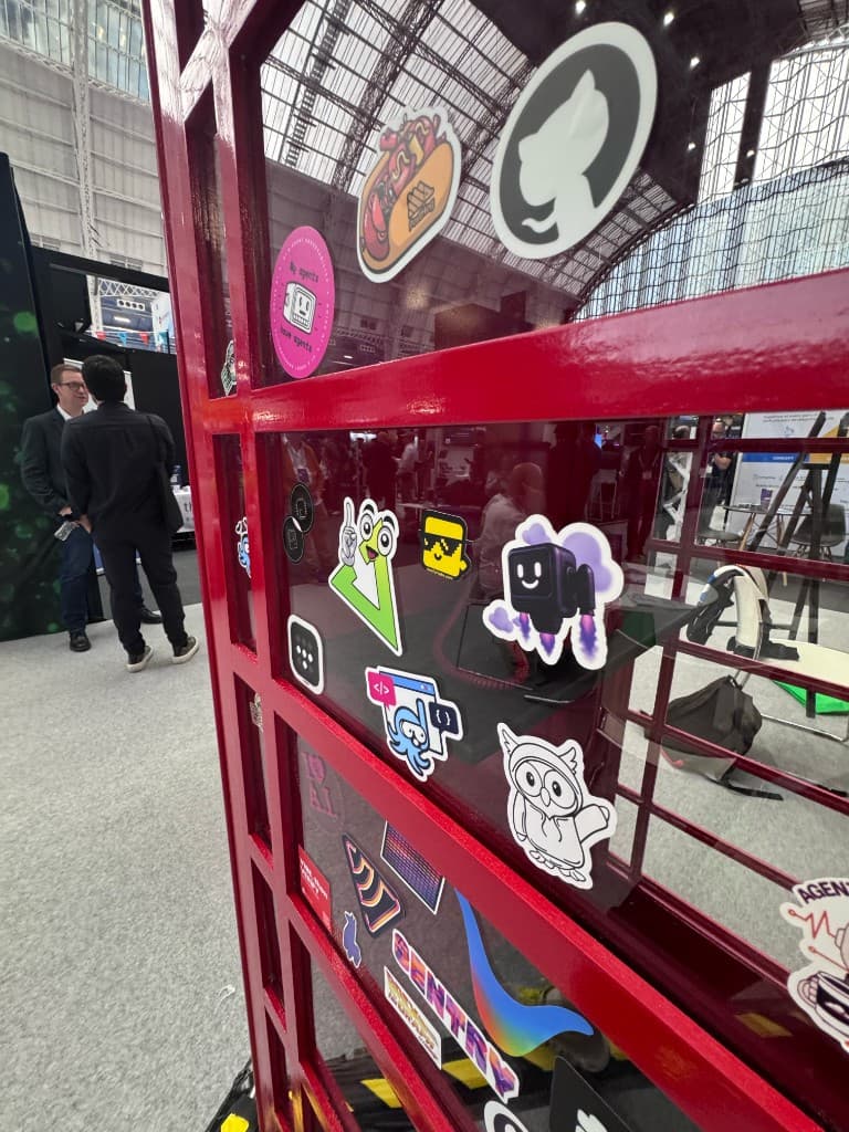 London telephone booth covered in tech stickers at London Tech Week