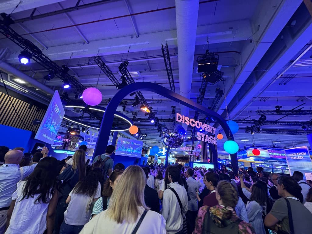 Discovery Stage crowd under a disco ball at Viva Technology 2026
