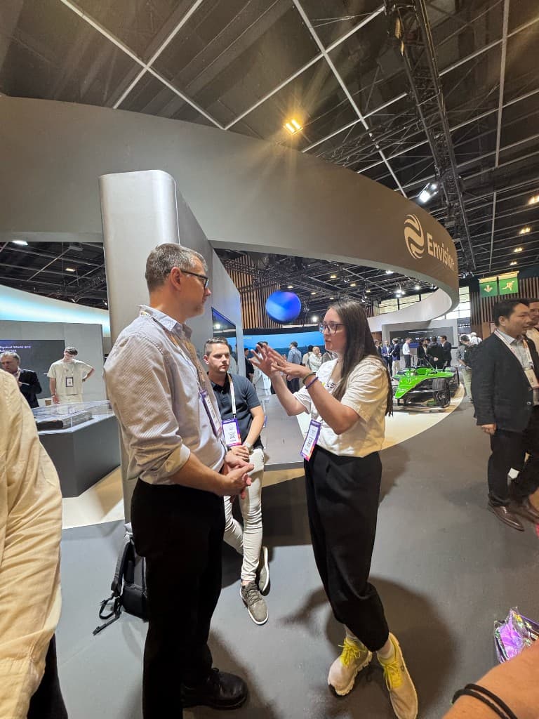 Networking conversation on the Viva Technology 2026 exhibition floor